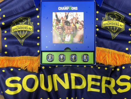 Watch a Sounders Match from the Press Club Suite (Includes food, drink & private bartender) + 4 Official Replica MLS Cup Rings & Authentic Sounders Scarves, “Scarves Up!” – For 5 people!